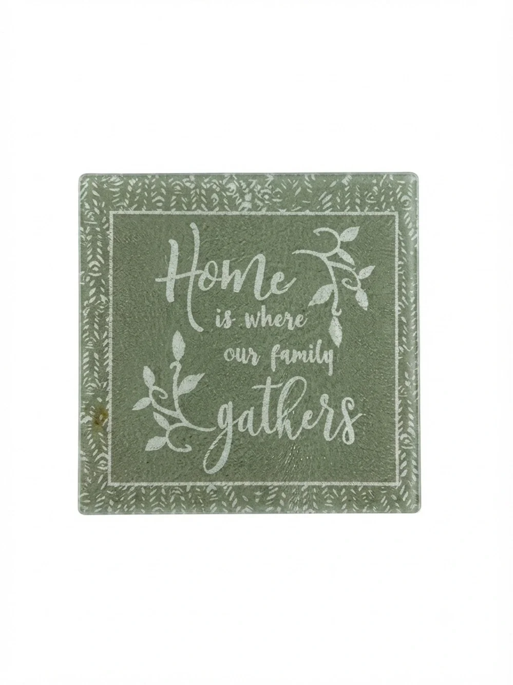 Decorative glass cutting board / trivet with non-slip rubber feet.
